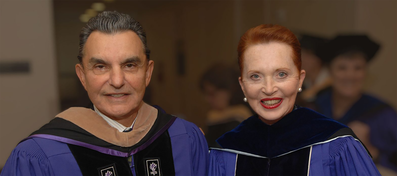 Marty and Connie Silver wearing academic attire